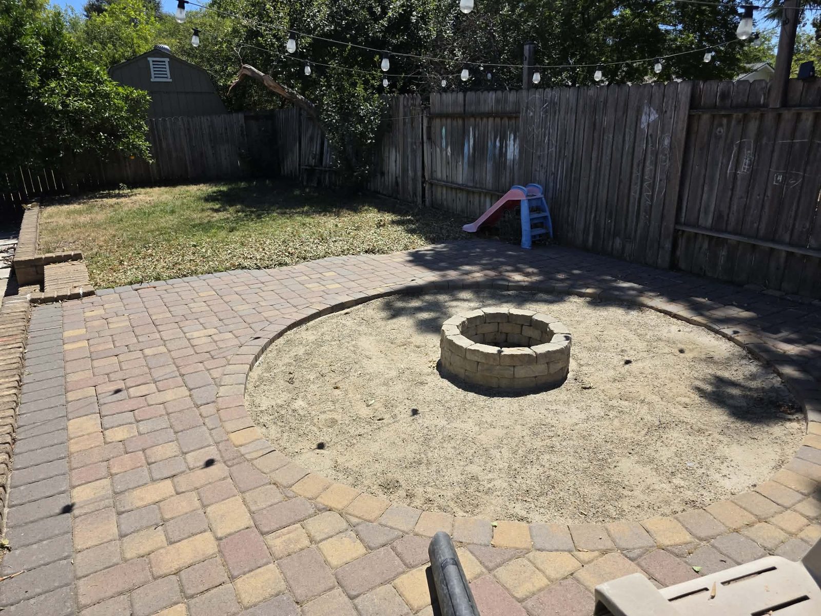 Clean Slate Hauling and Removal fire pit area after cleanup