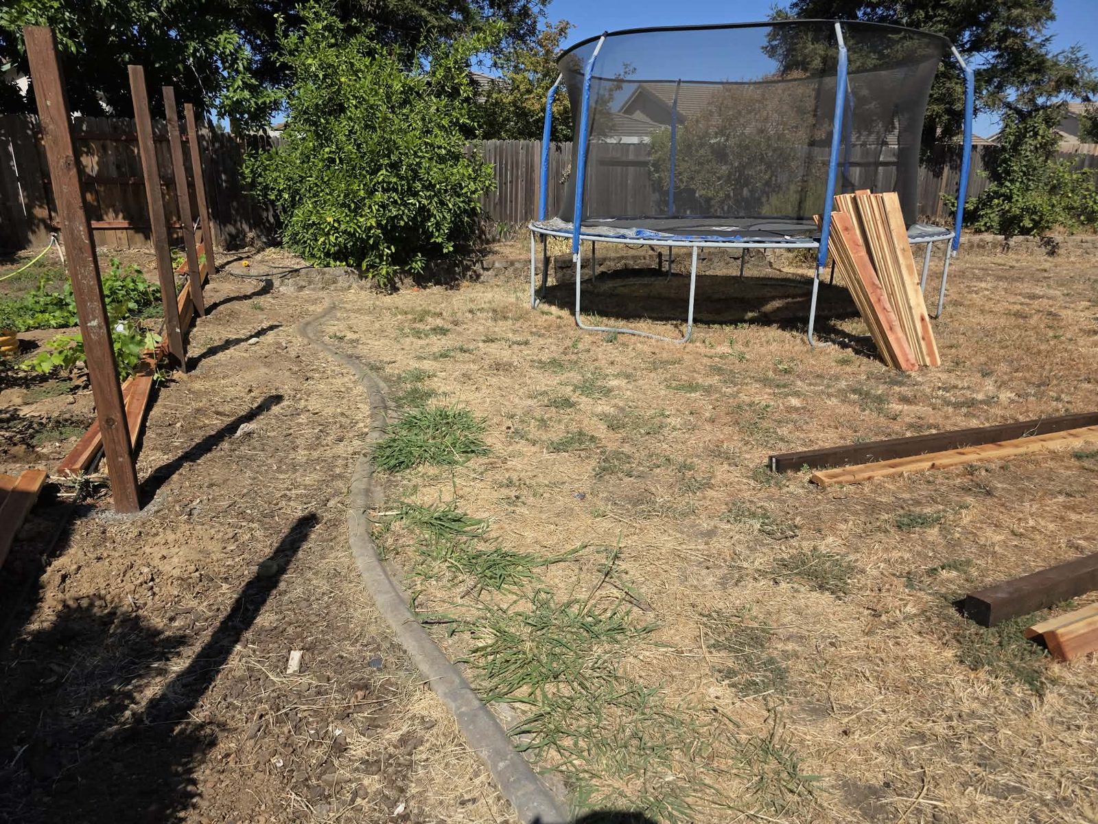 Clean Slate Hauling and Removal backyard cleared after debris removal